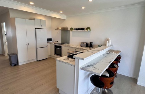 Papamoa Beach House | The Famous Blue Beachfront House - Papamoa Beach