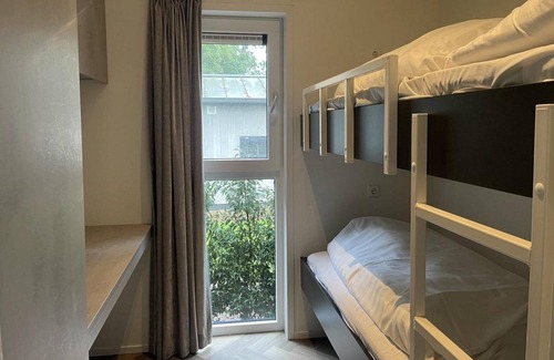 Municipality of Rhenen House | The Forest Cottage Deluxe is located right on the edge of the forest!