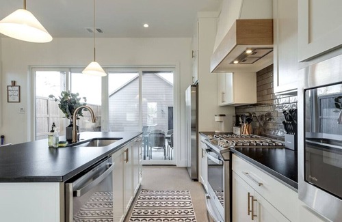 Central Oklahoma City House | The Fox at Wheeler | Garage & Courtyard