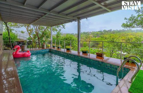 Anjaneri Villa | The Glasscape by StayVista - Hillside getaway with Pool and Indoor games