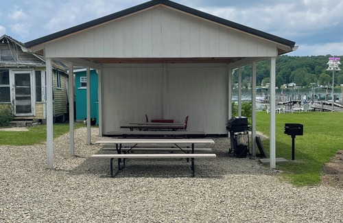 Canadohta Lake Cottage | The Goldfinch rustic lakefront cottage at The Pier at Canadohta Lake sleeps 2!