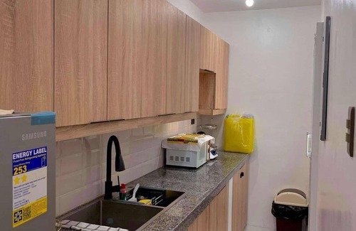 Plaridel House | The GrayHouse Inn is cozy 2 bedroom furnished house-full air conditioned place.