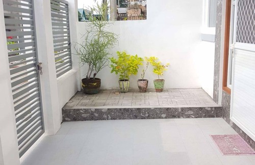 Plaridel House | The GrayHouse Inn is cozy 2 bedroom furnished house-full air conditioned place.