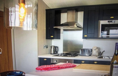 Leven Ski Chalet | The Heather Lodge. Cosy lodge with log burner and hot tub. Pet Friendly!