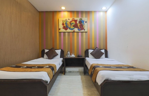East of Kailash Hotel | The Hermitage by Cosy Hotels