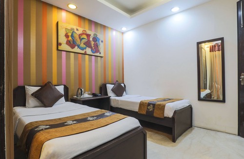 East of Kailash Hotel | The Hermitage by Cosy Hotels