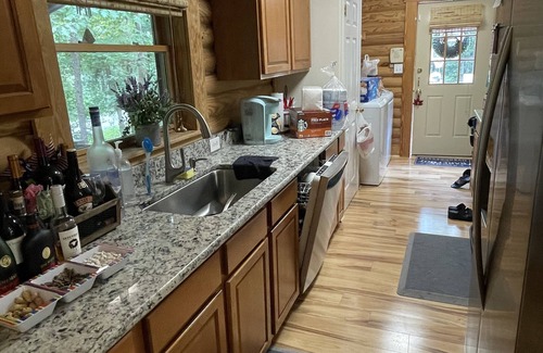 Bumpass House | The HIDAWAY. Relax on an acre modern log home in Lake Anna VA.