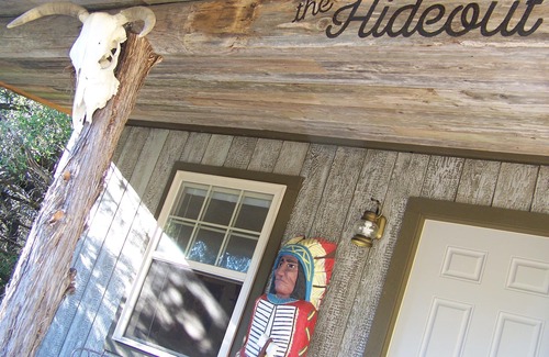 Leander Cabin | The Hideout is a quaint, cozy tiny house/cabin at Round Mountain Ranch