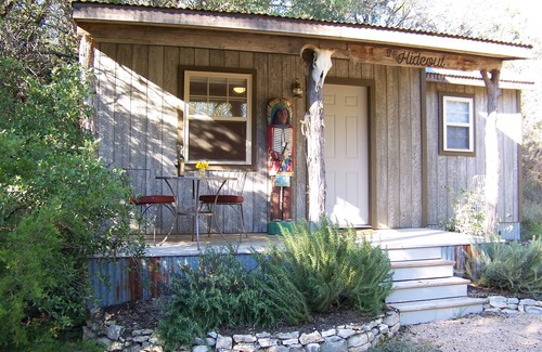 Leander Cabin | The Hideout is a quaint, cozy tiny house/cabin at Round Mountain Ranch