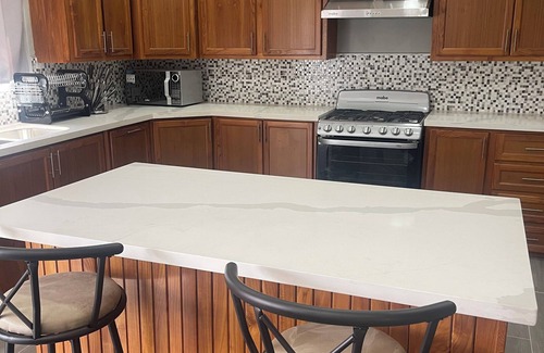 Arouca Apartment | The Home Stay:nCozy 2-bedroom apartment in fantastic La Resource Rd., D'Abadie.