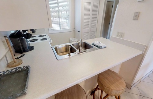 Holiday Isle Condo | The Islander 115 Heated Pool- Hot Tub- Pickle Ball