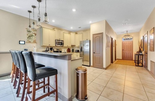 Davenport House | The Jurassic Palace 9BR Resort Pool Home By Disney