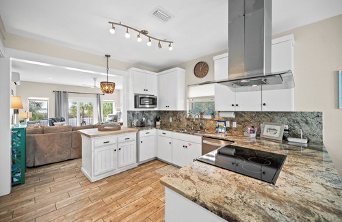 Sharp Reef House | The Key Lime Cottage - A Perfect Beach Retreat, with a private heated pool!
