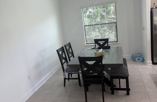 Haines City House | The laid-back 4-bedroom Villa features a private swimming pool in Haines City.