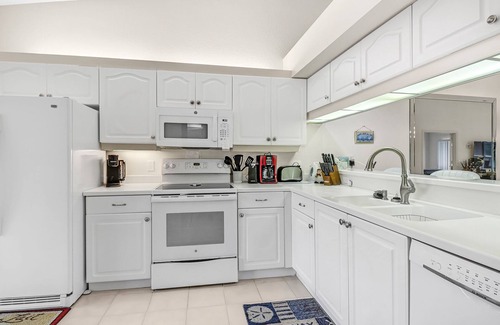 Naples Condo | The LARGEST Tropical Style Pool in S.W. Florida! GORGEOUS lake view!