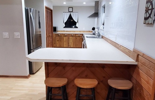 Astor House | The Launch Pad - Dog-friendly House with Boat Ramp on deep canal corner lot