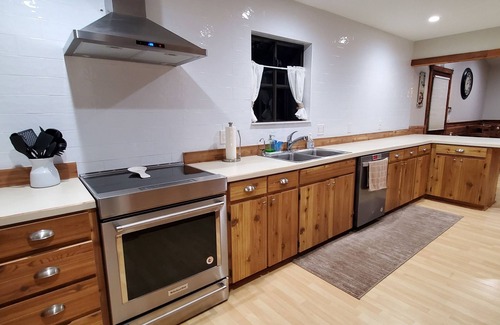Astor House | The Launch Pad - Dog-friendly House with Boat Ramp on deep canal corner lot