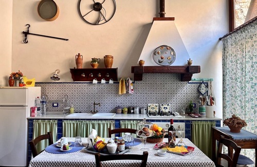 Castelbuono House | The Little House in the Courtyard, cozy vacation home with private courtyard in the center