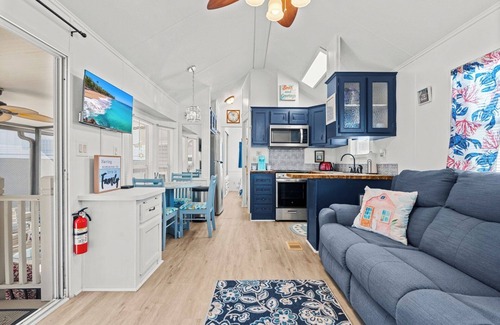Upper Grand Lagoon House | The Little Love Bug: 2-pup friendly, golf cart, screened porch, near beach/pool