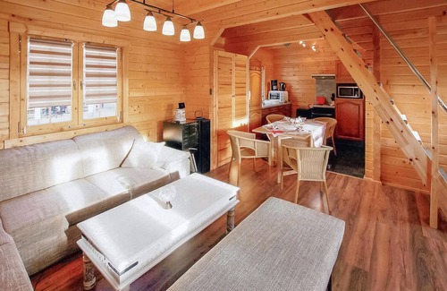 Kleinzerlang House | The log cabin-style holiday home for up to 4 people is located on the owners' approx.