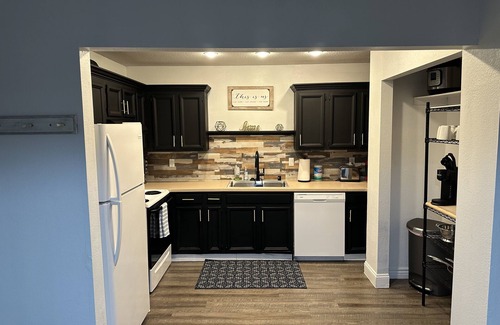 Sand Lake House | *The Lovely Place* Stunning 3BR 1.5 BA Sleeps 7. Private driveway RV parking.