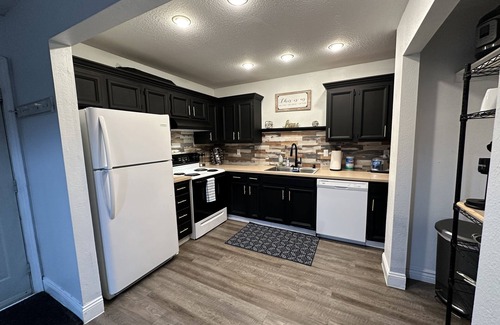 Sand Lake House | *The Lovely Place* Stunning 3BR 1.5 BA Sleeps 7. Private driveway RV parking.