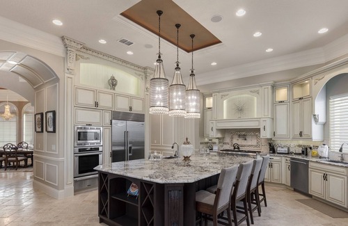 Four Corners Villa | The Mansion at Reunion | 9 Bed, 11 Bath, 10,000 sq ft, Huge Screened Pool, 2 Games Room