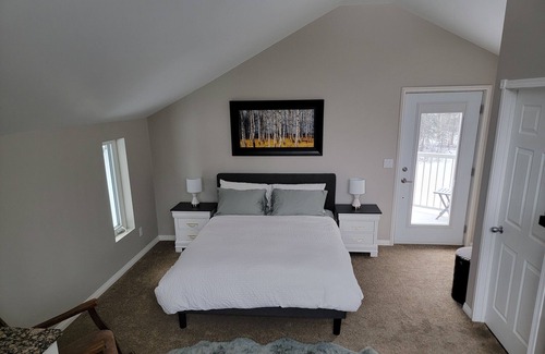 Whitehorse Cabin | The Meadow Cabin. Enjoy the Northern Lights from your bed or balcany.