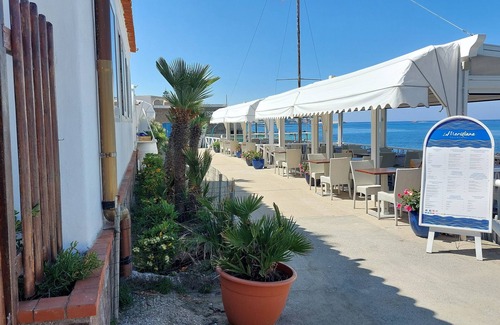 Forio House | THE MERIDIANA APARTMENT ON THE SEA WITH PRIVATE BEACH SDRAIO AND UMBRELLA