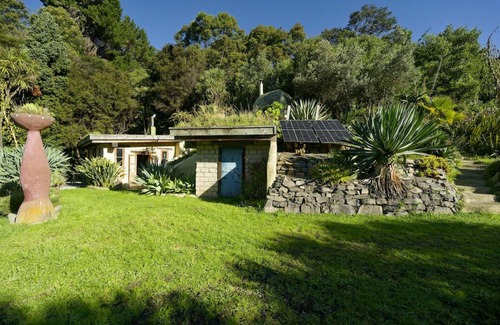 Pigeon Bay Apartment | The Mud House— earth studio in Pigeon Bay with views, wood-fired sauna & bath!