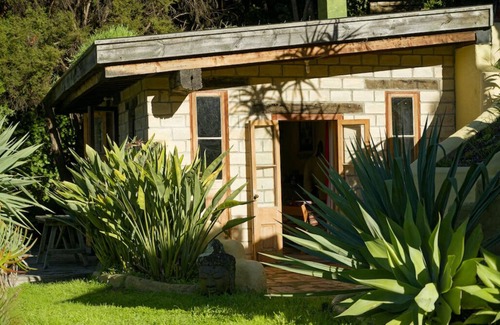Pigeon Bay Apartment | The Mud House— earth studio in Pigeon Bay with views, wood-fired sauna & bath!