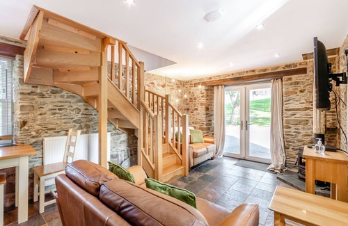 Llanybri Cottage | THE OLD CORN STORE, family friendly, with open fire in St Clears