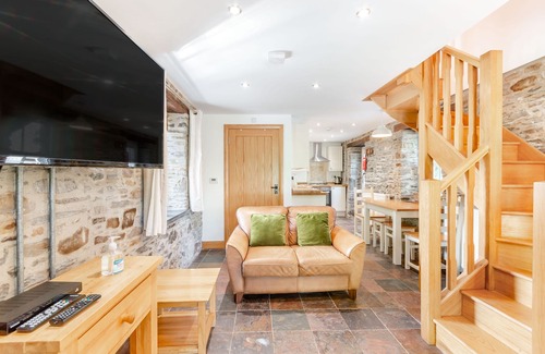 Llanybri Cottage | THE OLD CORN STORE, family friendly, with open fire in St Clears