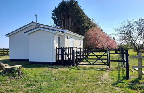 Frettenham House | The Paddocks - a bungalow situated in a rural village surrounded by fields and horses