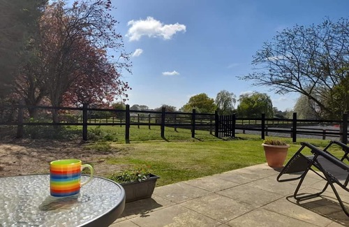 Frettenham House | The Paddocks - a bungalow situated in a rural village surrounded by fields and horses