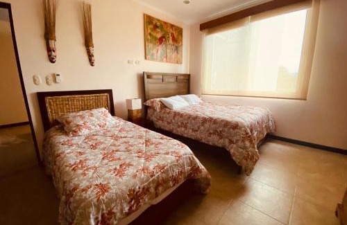 Barrio Los Villalobos Apartment | The Palms Oceanfront Condo 604
