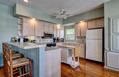 Ocean Isle Beach Cottage | The Perfect Getaway! Dock, King Suite, Pet & Family Friendly