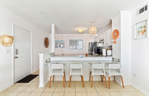 Sneads Ferry Condo | The Pink Pearl - Top Floor Beachfront Boho Condo with Community Pool!