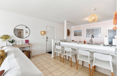 Sneads Ferry Condo | The Pink Pearl - Top Floor Beachfront Boho Condo with Community Pool!