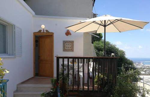 Haifa Apartment | The Potter's House overlooking the Bay of Haifa