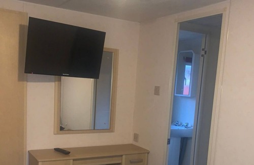 Saint Asaph House | The Rabbit Warren - a 6 berth caravan with private patio and hot tub