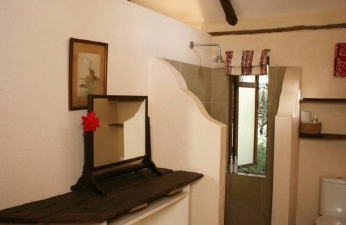 Langata House | The Red Cottage With Pool In A Wild Garden, Karen