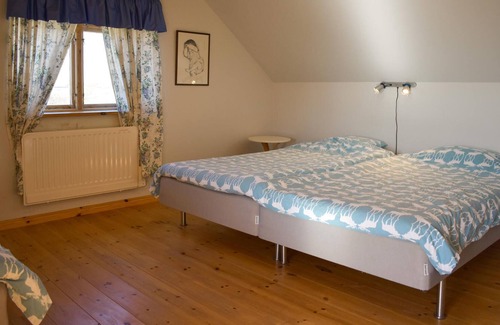 Glemminge House | The renovated cottage on a round yard with beautiful views of the open countryside just outside the