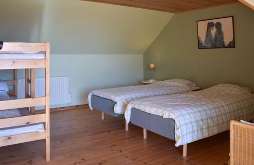 Glemminge House | The renovated cottage on a round yard with beautiful views of the open countryside just outside the