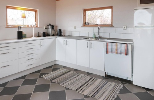 Glemminge House | The renovated cottage on a round yard with beautiful views of the open countryside just outside the
