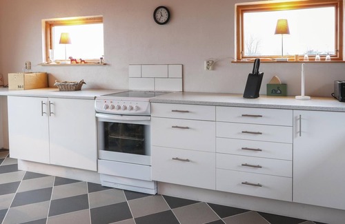 Glemminge House | The renovated cottage on a round yard with beautiful views of the open countryside just outside the