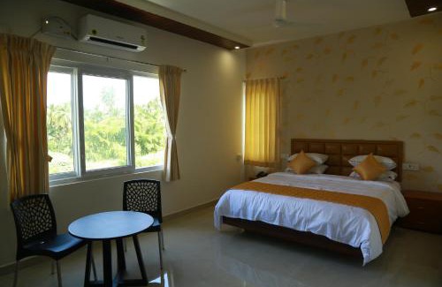 Theni Hotel | THE RIVIERA