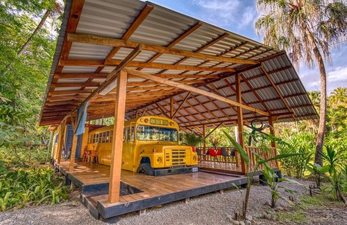 Chiguata House | The School Bus is located on beautiful Beach front property