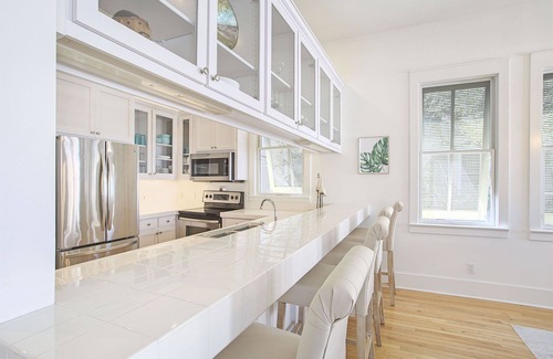 Frangista Beach House | The Salty Palm - Pet Friendly, Heated Community Pool, Free Beach Service!