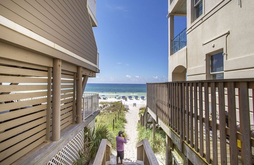 Frangista Beach House | The Salty Palm - Pet Friendly, Heated Community Pool, Free Beach Service!